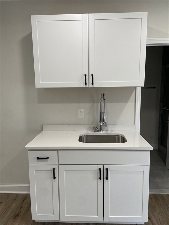 92 South Common Street, Unit 5 Lynn, MA 01902 - Photo 2 of 5 a bathroom with a sink and a mirror