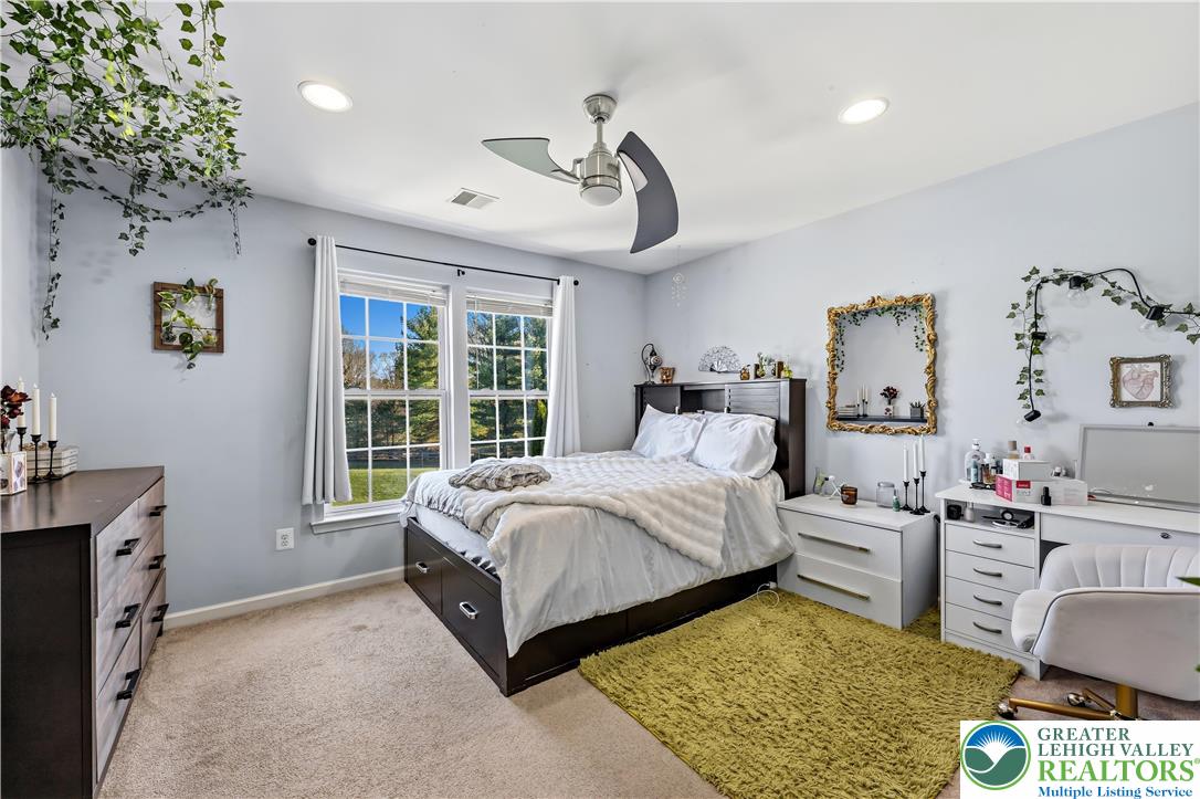 130 Lower Way Road Easton, PA 18045 - Photo 31 of 56 a spacious bedroom with a bed table and window