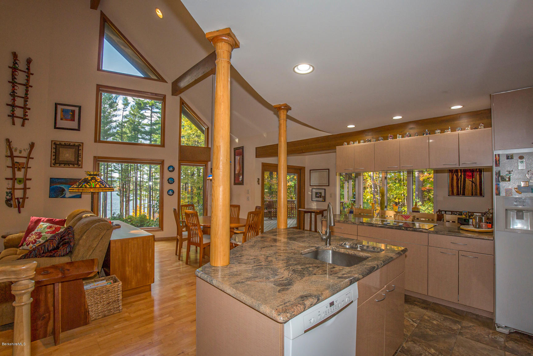 57 Golden Hill Road Lee, MA 01238 - Photo 12 of 43 a kitchen with stainless steel appliances granite countertop a sink and a refrigerator