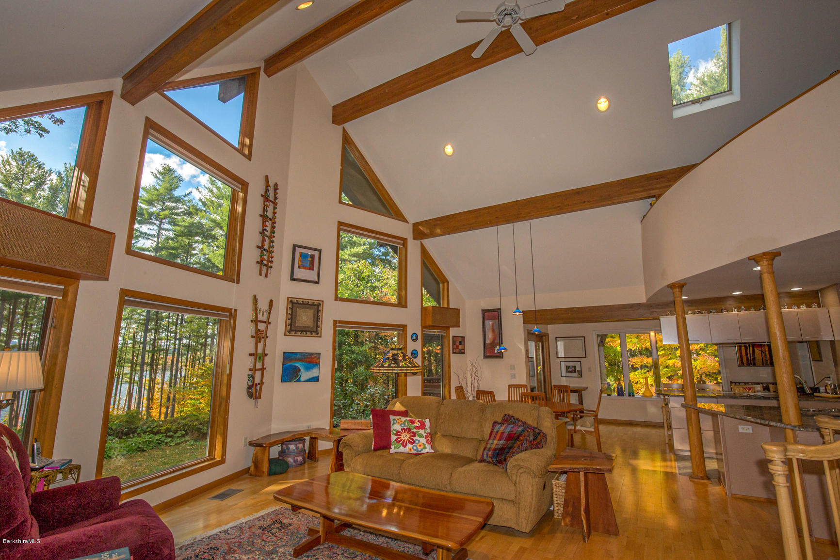 57 Golden Hill Road Lee, MA 01238 - Photo 13 of 43 a living room with fireplace furniture and a large window