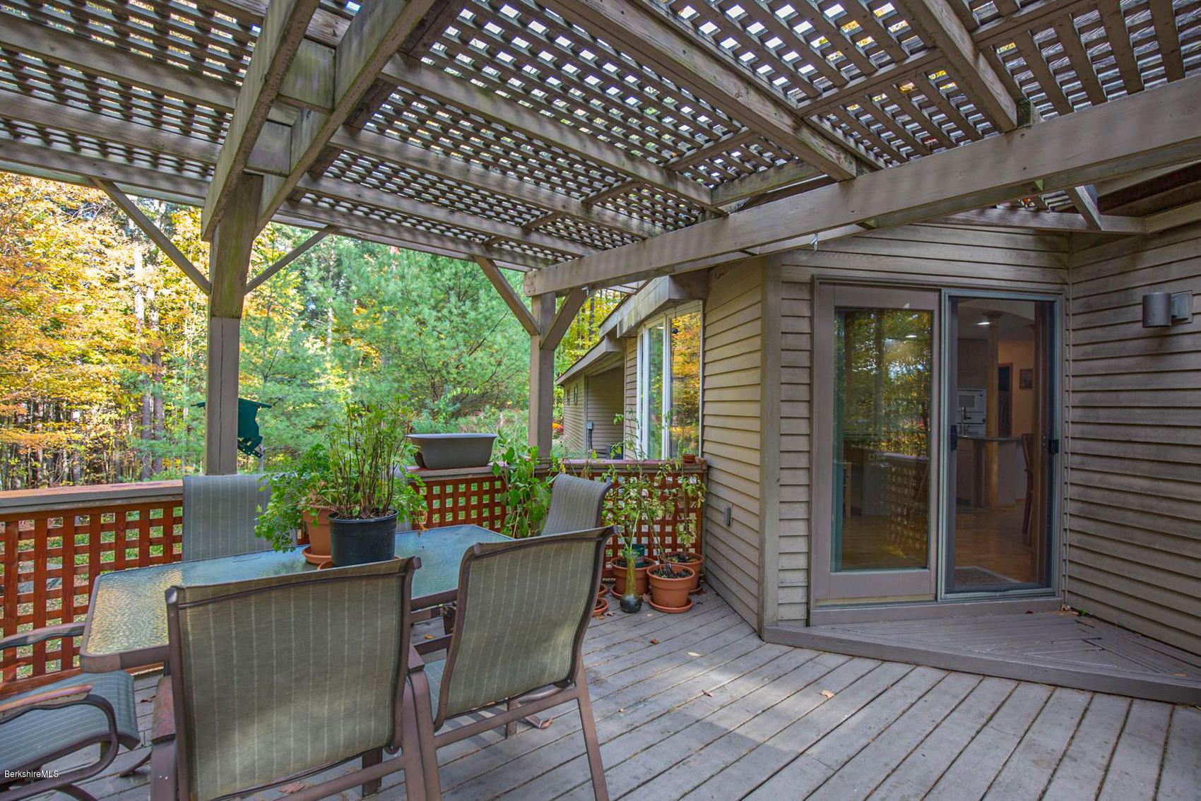 57 Golden Hill Road Lee, MA 01238 - Photo 19 of 43 a view of a porch with furniture and wooden floor