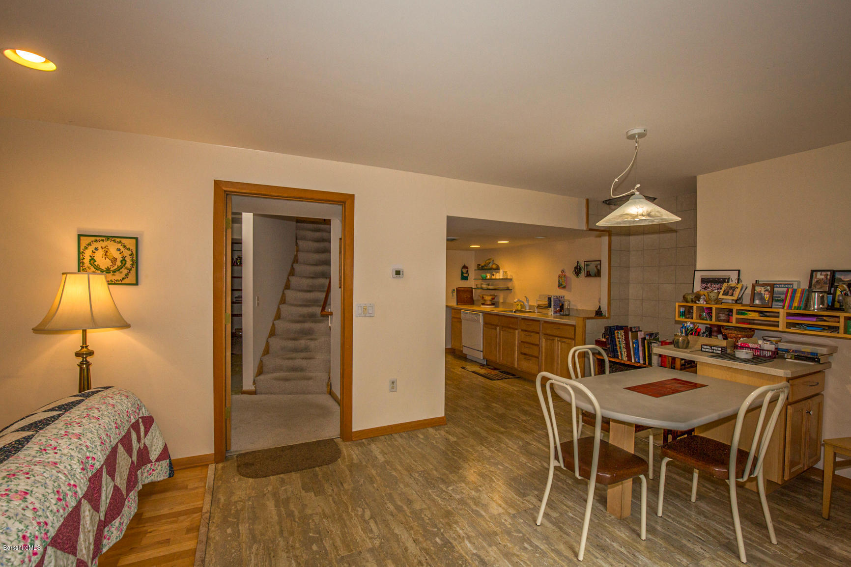 57 Golden Hill Road Lee, MA 01238 - Photo 31 of 43 a view of a dining room with furniture and wooden floor