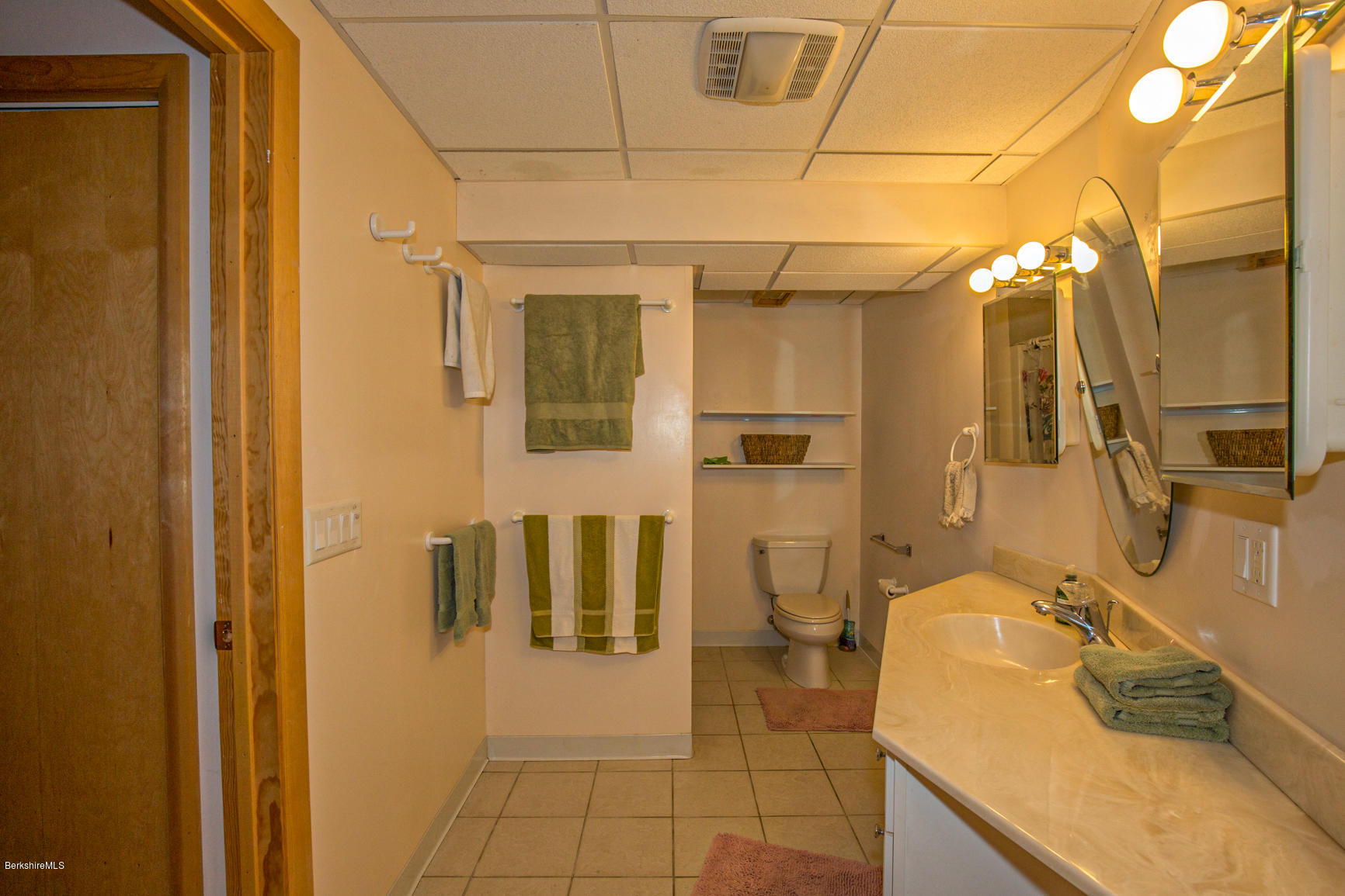 57 Golden Hill Road Lee, MA 01238 - Photo 36 of 43 a bathroom with a sink and mirror
