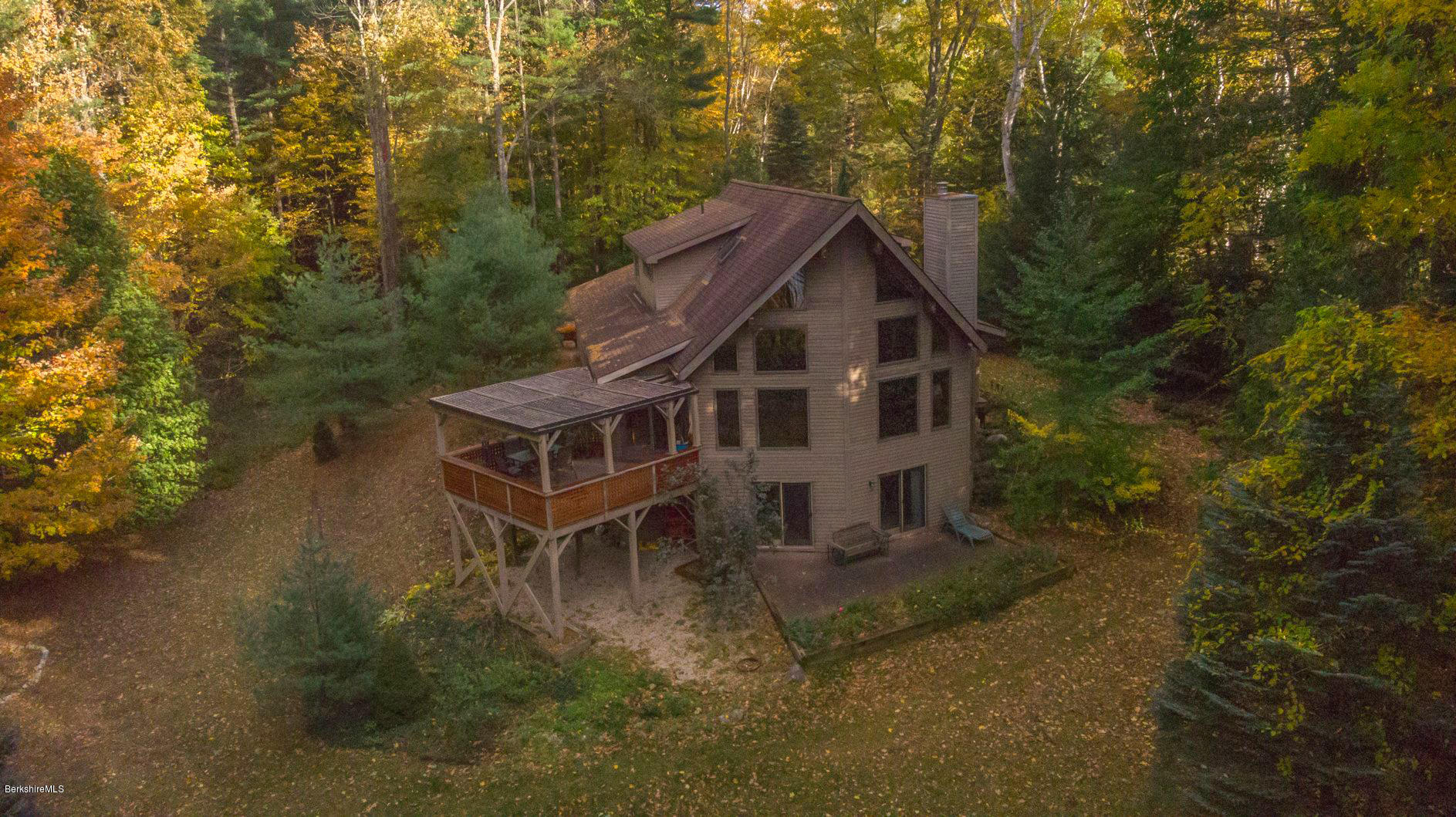57 Golden Hill Road Lee, MA 01238 - Photo 38 of 43 front view of a house with a yard