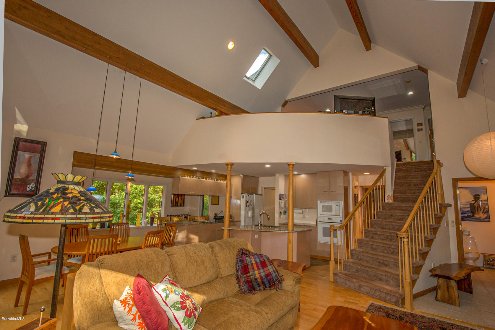 57 Golden Hill Road Lee, MA 01238 - Photo 7 of 43 a very nice looking living room with dining room and wooden floor