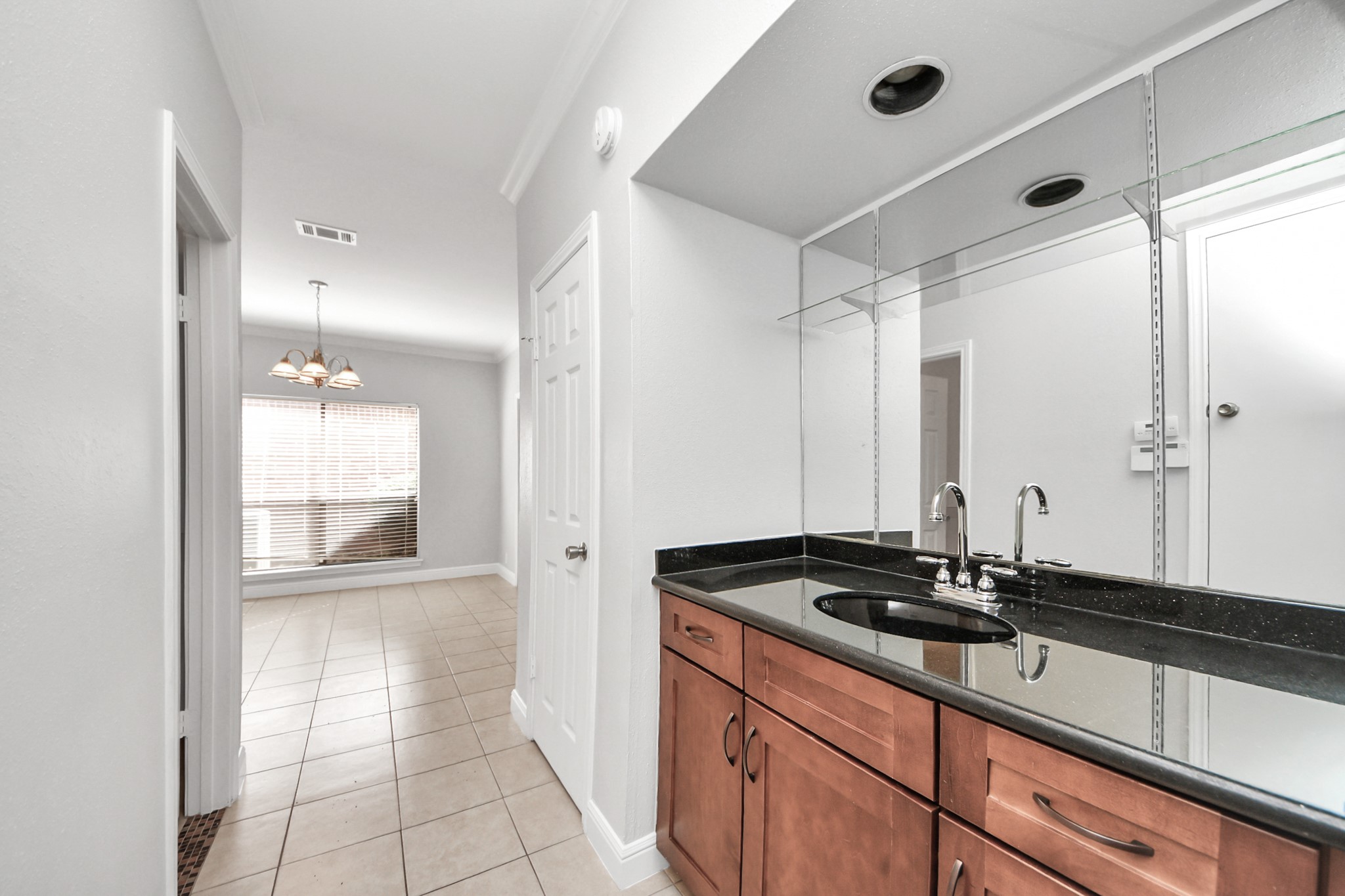 2468 Bering Drive Houston, TX 77057 - Photo 14 of 30 Spacious vanity area with ample storage and a sleek design.