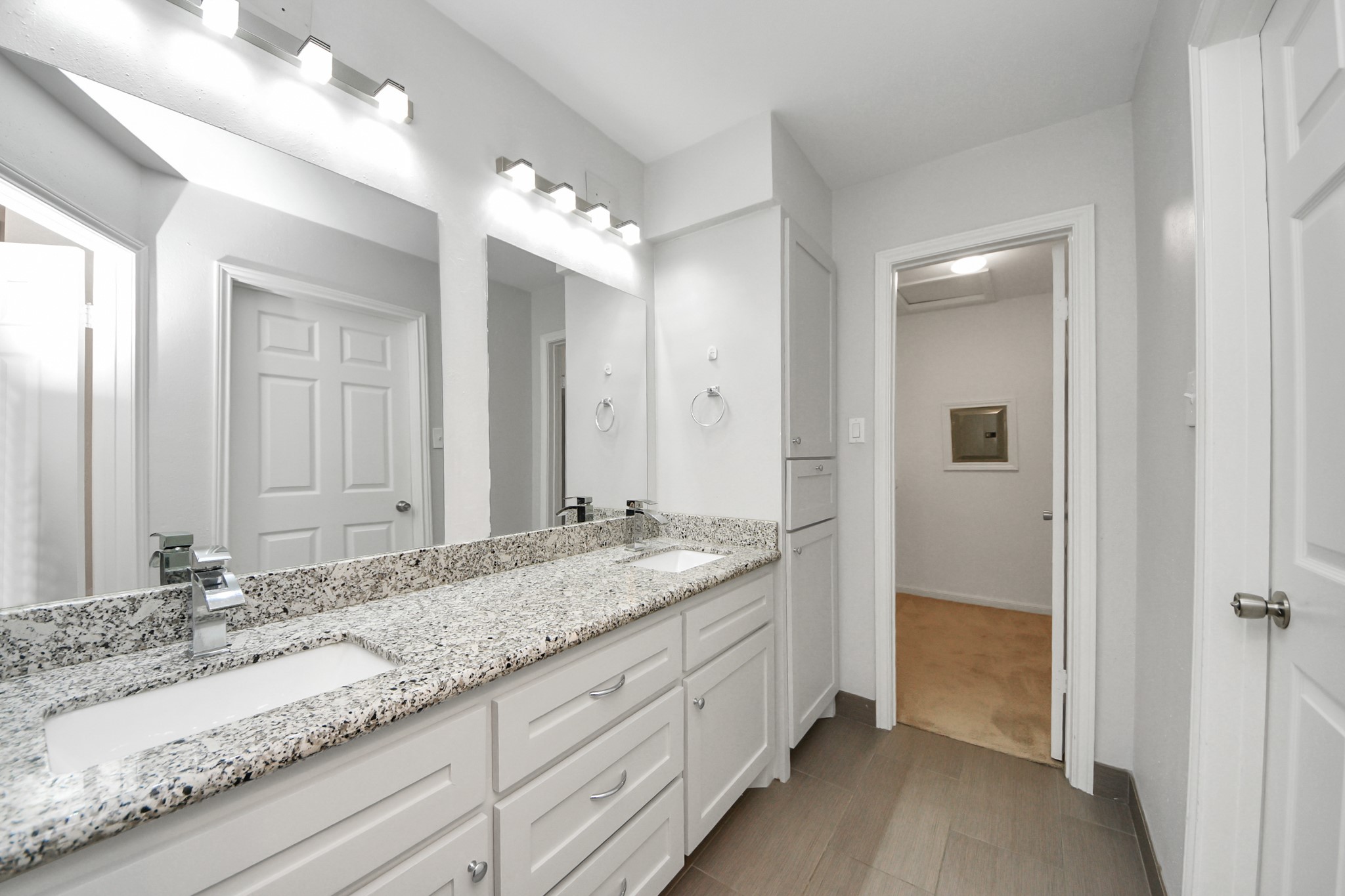 2468 Bering Drive Houston, TX 77057 - Photo 16 of 30 Expansive bathroom with dual sinks and generous counter space.