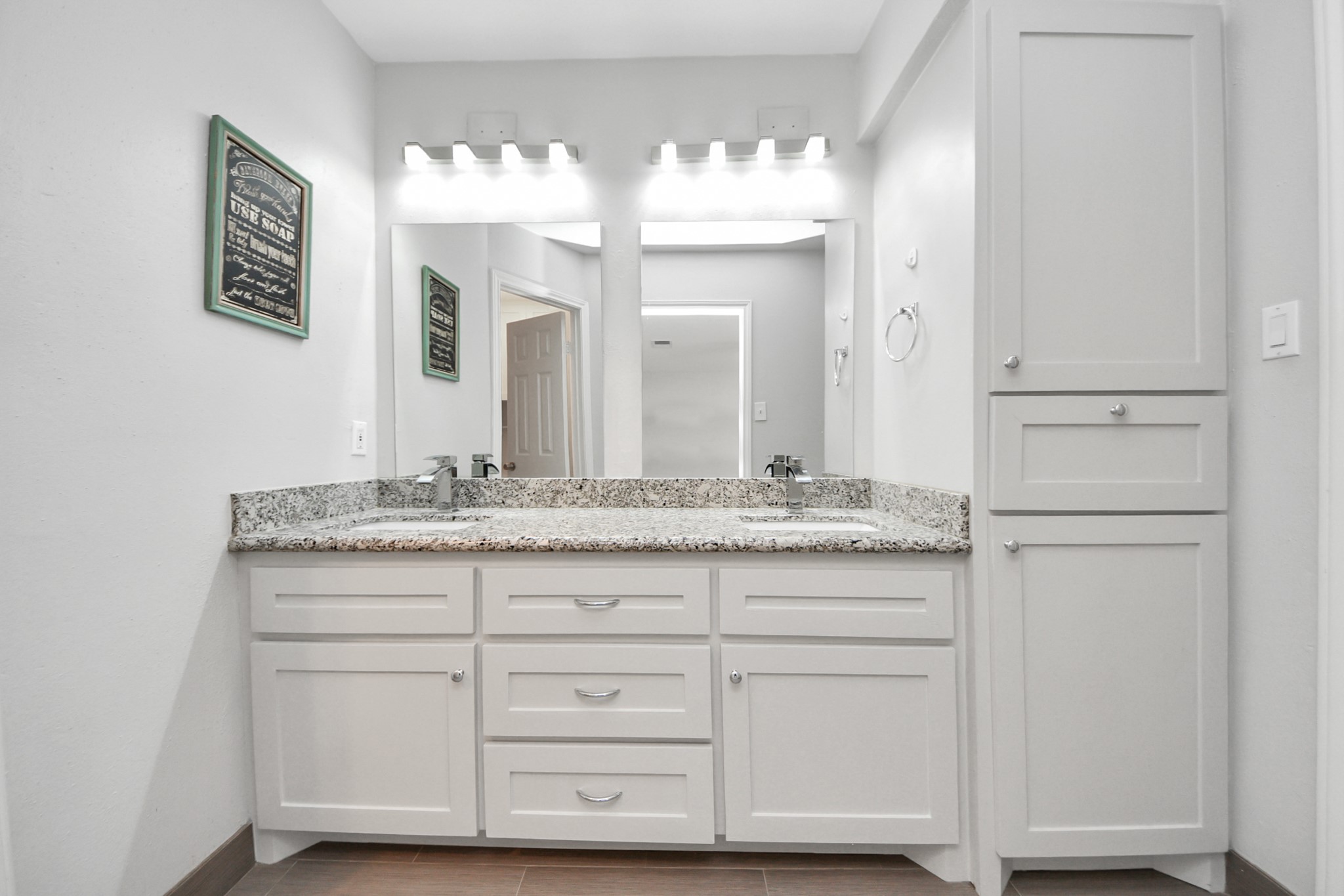 2468 Bering Drive Houston, TX 77057 - Photo 19 of 30 Stylish vanity with ample storage and generous counter space.