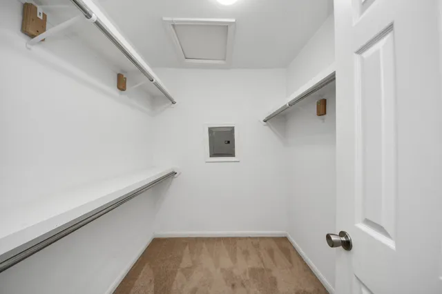 a view of small space with racks on the wall