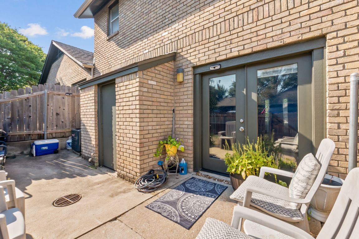 1015 East Yager Lane, Unit 56 Austin, TX 78753 - Photo 8 of 9 a view of a backyard with a patio