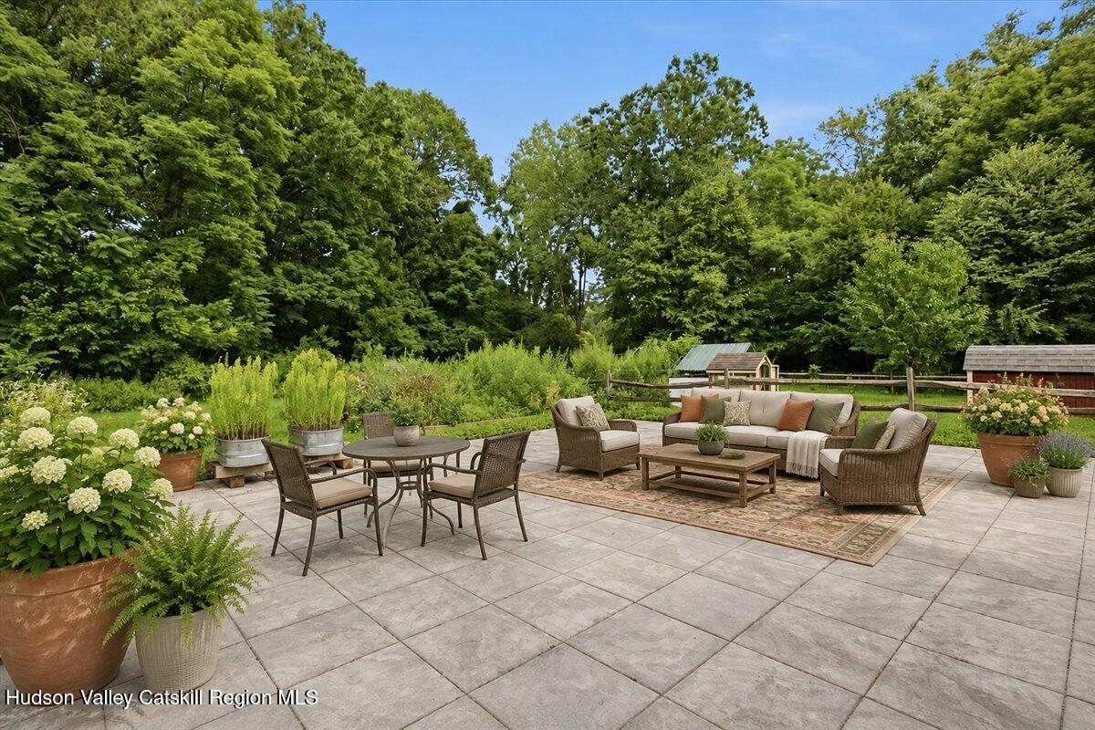 182 Red Rock Road Leeds, NY 12451 - Photo 8 of 53 08-04-Back Patio & Yard AI Staging
