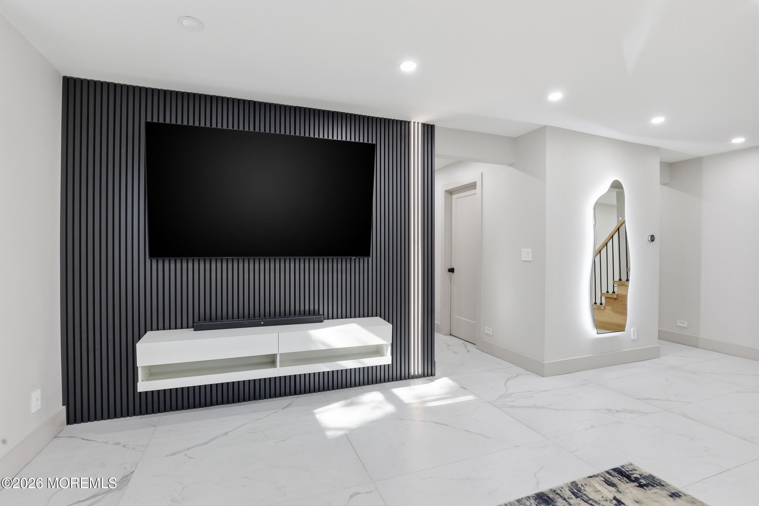 492 Cobain Road Jackson, NJ 08527 - Photo 10 of 47 a bathroom with a tub and a flat screen tv