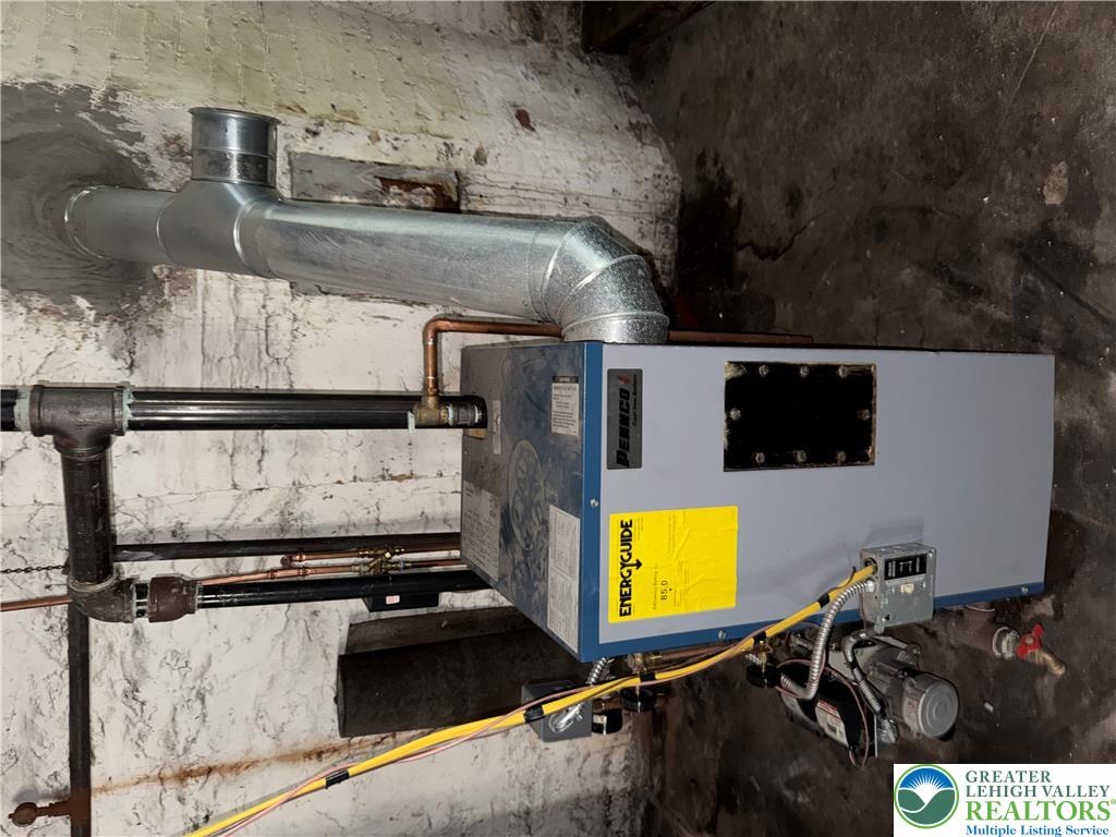 41 West Ridge Street Lansford, PA 18232 - Photo 36 of 40 Well-maintained furnace with efficient heating ready for immediate use.
