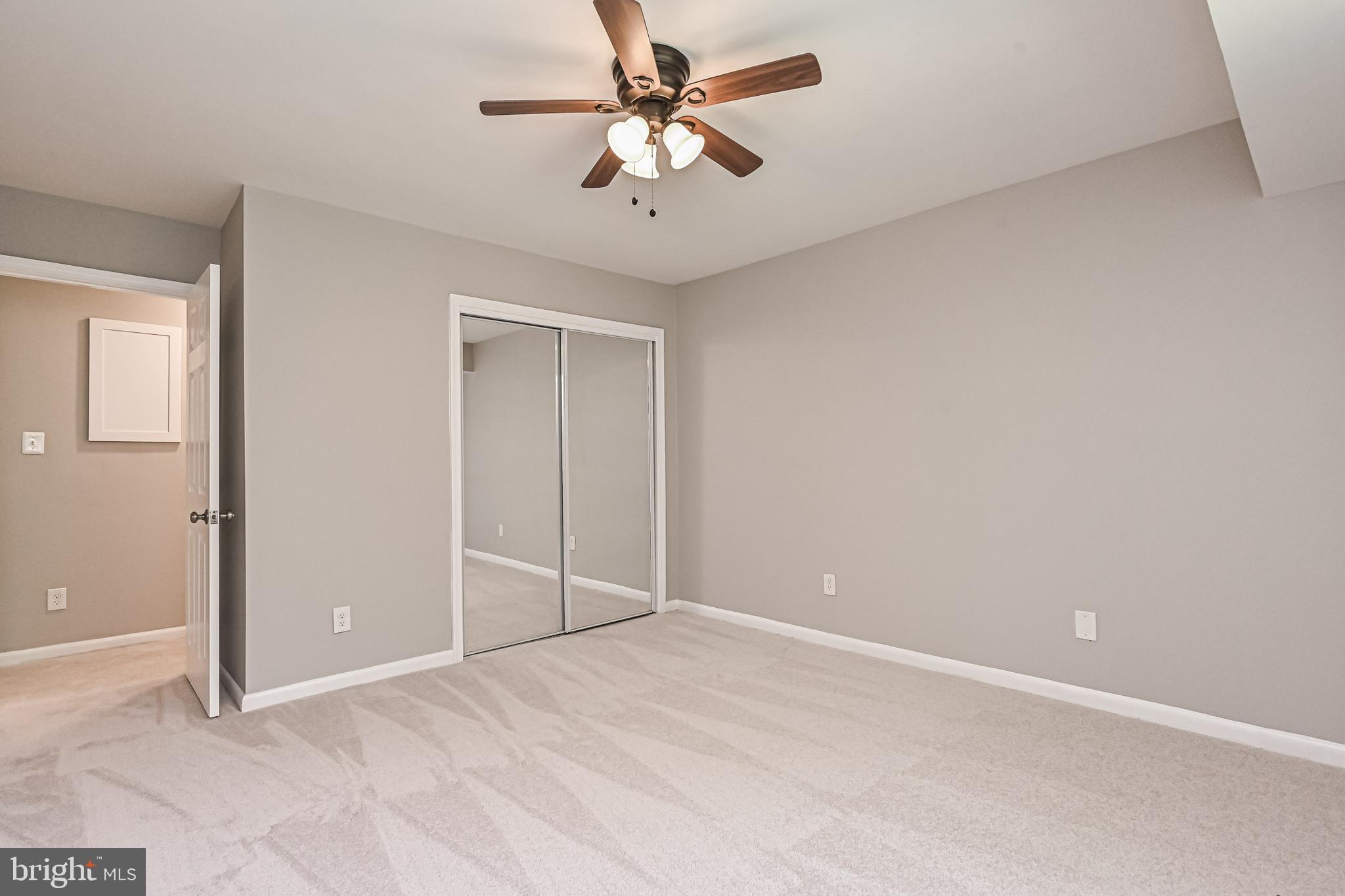 8110 Colony Point Road, Unit 216 Springfield, VA 22152 - Photo 15 of 28 Bedroom w/mirrored closet doors
