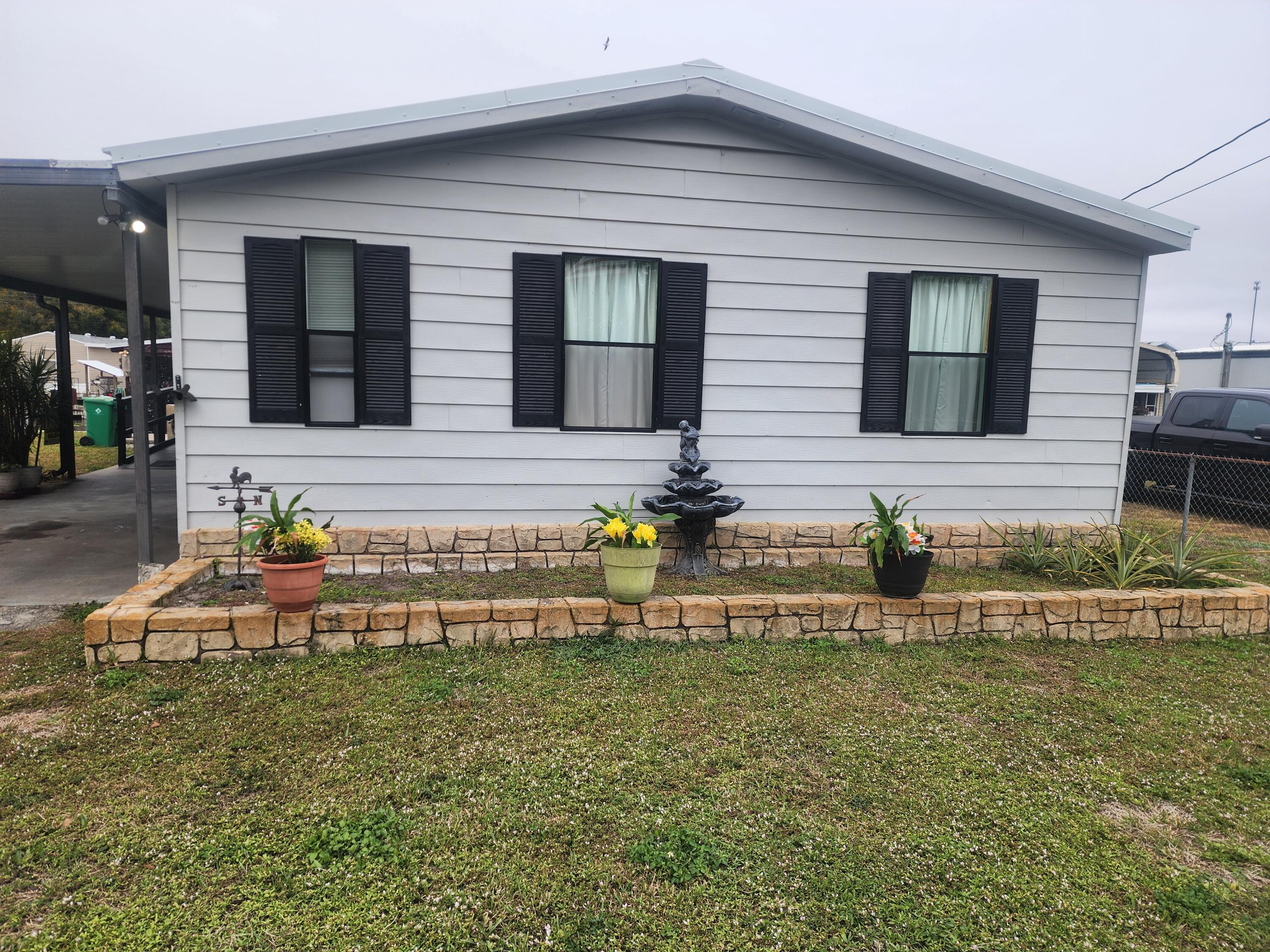 1414 Hunter Road Okeechobee, FL 34974 - Photo 2 of 30 Front view