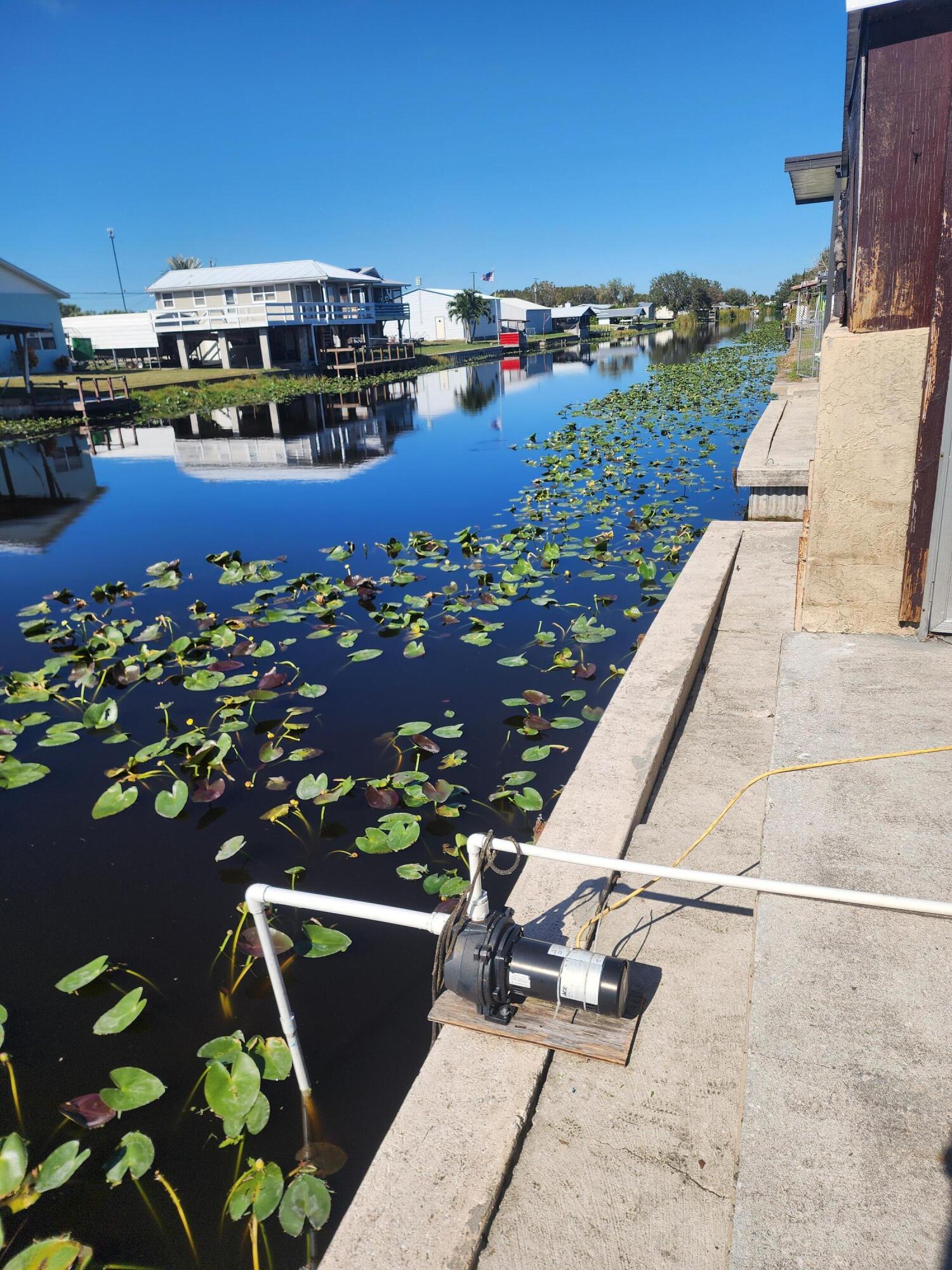 1414 Hunter Road Okeechobee, FL 34974 - Photo 24 of 30 canal pump