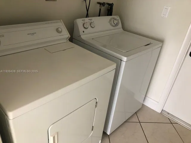 a view of a street with a houses