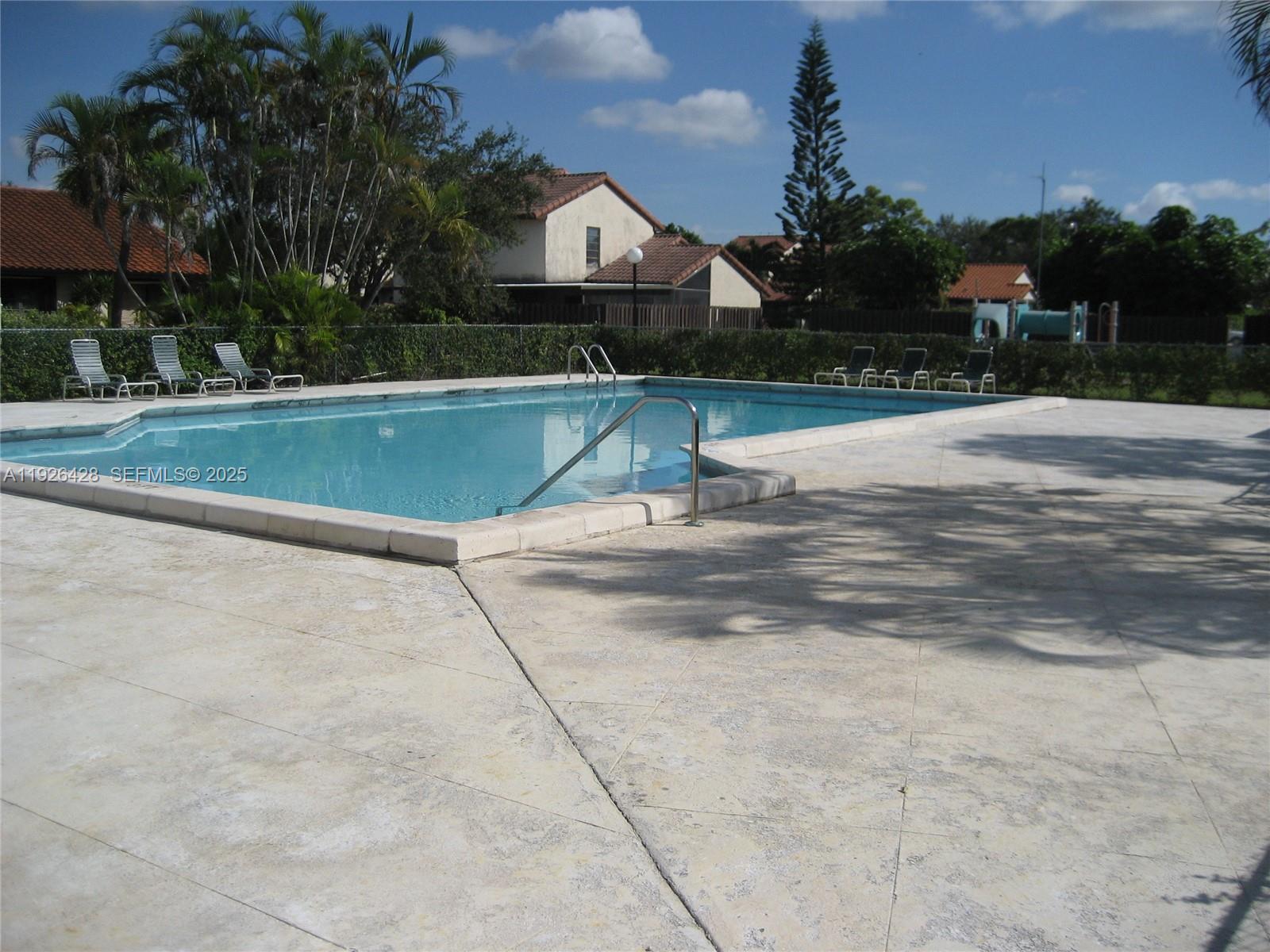 9044 Southwest 112th Court Miami, FL 33176 - Photo 15 of 19 a view of outdoor space yard and swimming pool