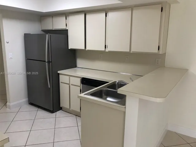 a utility room with washer and dryer