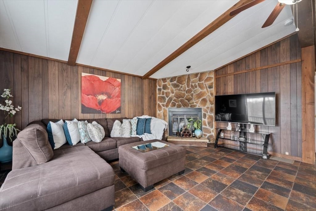 105 Geneva Street Springfield, MA 01151 - Photo 12 of 39 a living room with furniture and a flat screen tv