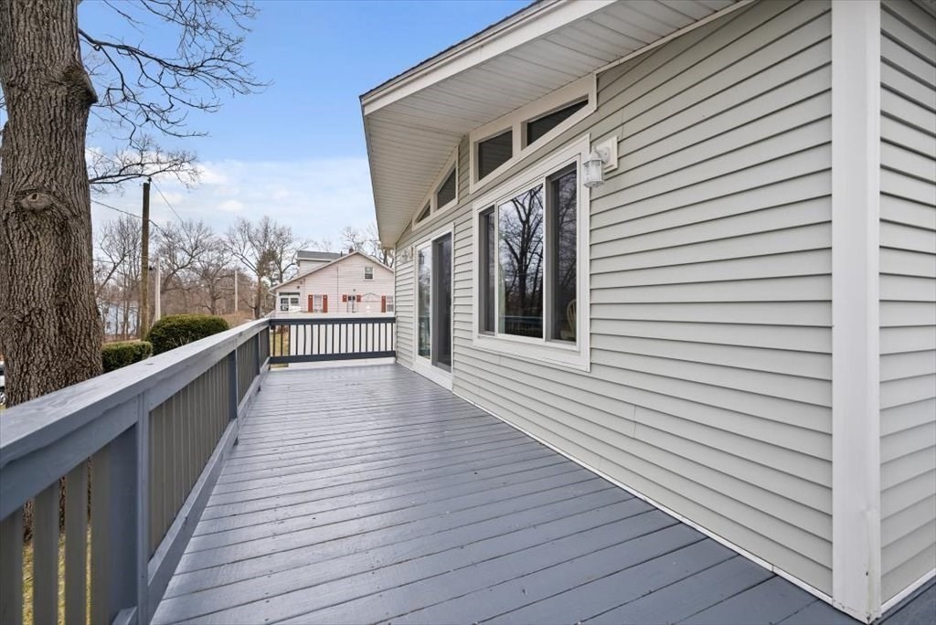 105 Geneva Street Springfield, MA 01151 - Photo 23 of 39 a view of a balcony with wooden floor and fence