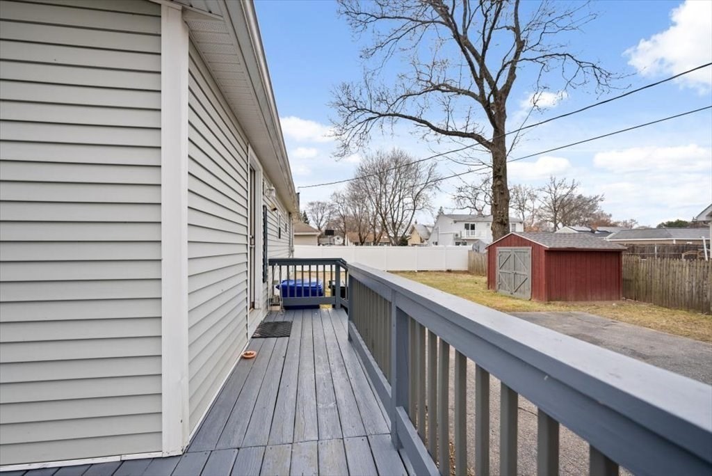 105 Geneva Street Springfield, MA 01151 - Photo 25 of 39 a view of balcony with wooden floor and fence