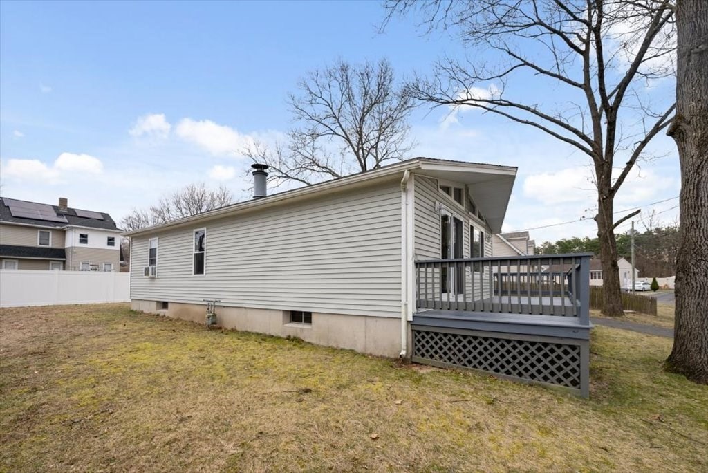 105 Geneva Street Springfield, MA 01151 - Photo 28 of 39 a view of a house with a yard
