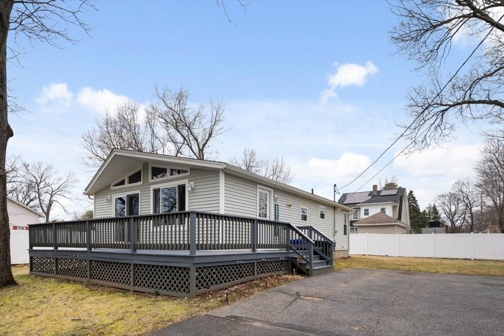 105 Geneva Street Springfield, MA 01151 - Photo 31 of 39 a view of a house with a yard