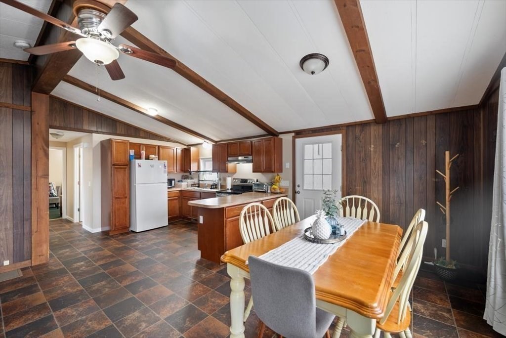 105 Geneva Street Springfield, MA 01151 - Photo 8 of 39 a dinning area with a table and chairs