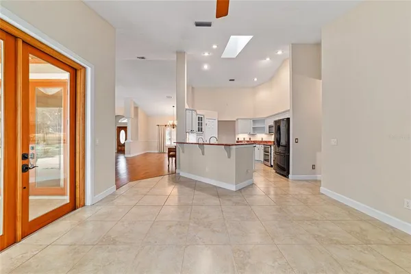 a kitchen with stainless steel appliances a stove sink microwave and cabinets