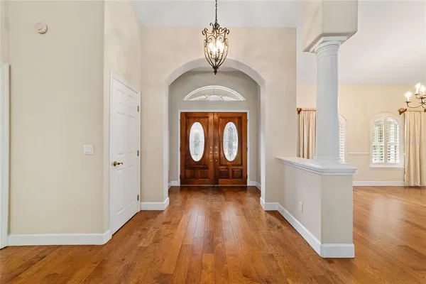 a view of entryway with wooden floor