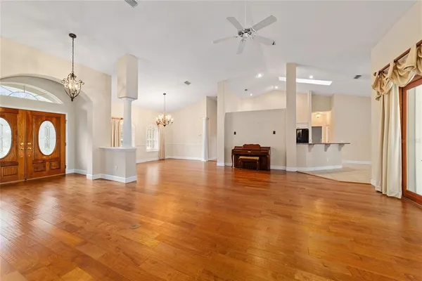 a view of a livingroom with furniture and wooden floor