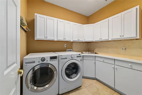 a aerial view of a house with a yard