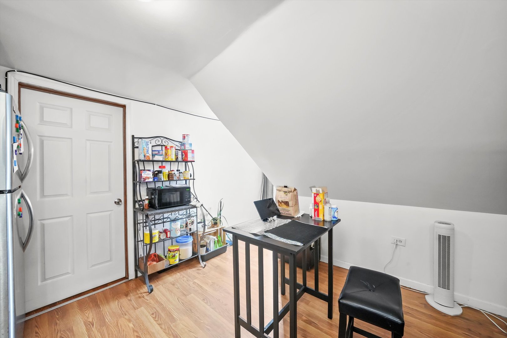 3020 South Pulaski Road Chicago, IL 60623 - Photo 30 of 44 a view of a livingroom with furniture and wooden floor