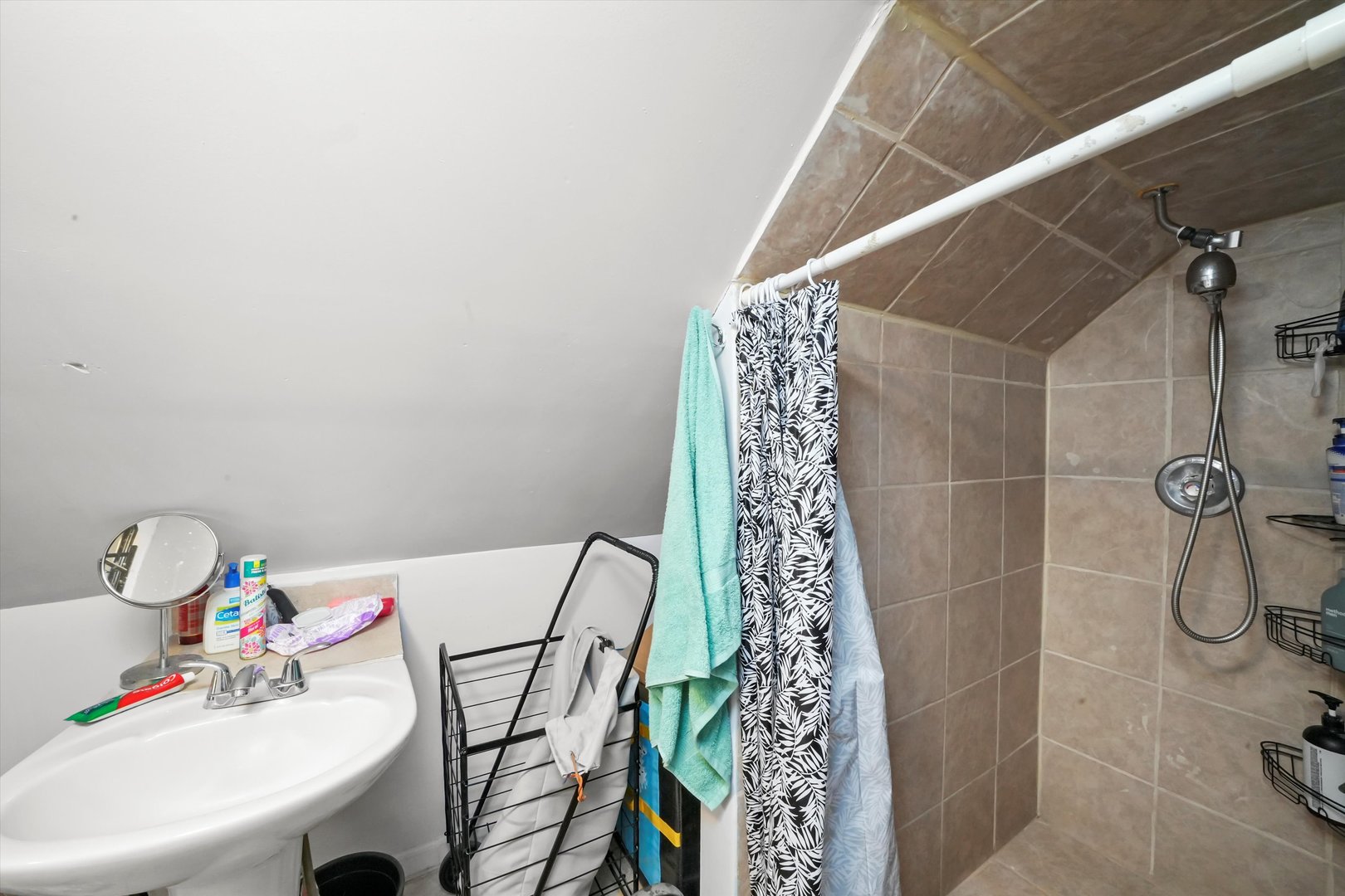 3020 South Pulaski Road Chicago, IL 60623 - Photo 37 of 44 a bathroom with a sink and a shower