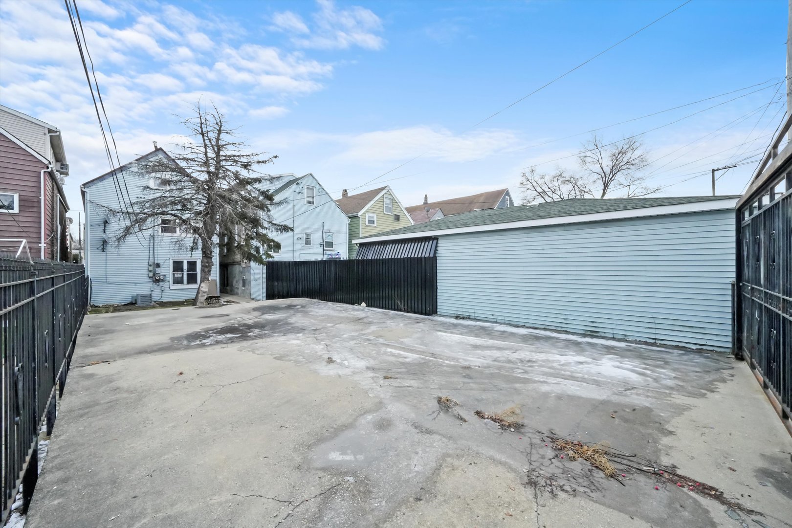 3020 South Pulaski Road Chicago, IL 60623 - Photo 42 of 44 a view of a house with a snow on the road