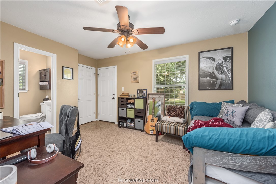 112 Rebecca Street Bryan, TX 77801 - Photo 12 of 18 a living room with furniture and a window