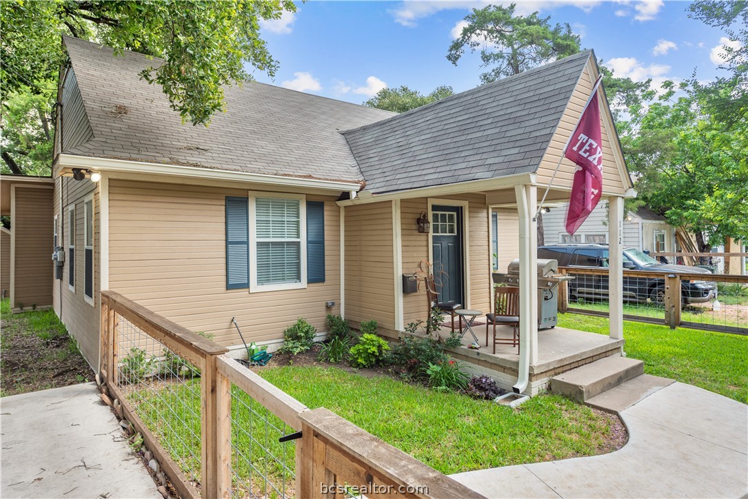 112 Rebecca Street Bryan, TX 77801 - Photo 2 of 18 front view of a house with a yard