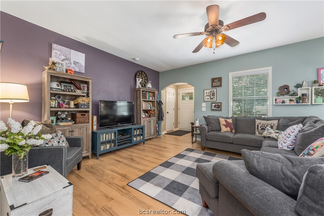 112 Rebecca Street Bryan, TX 77801 - Photo 5 of 18 a living room with furniture and a flat screen tv