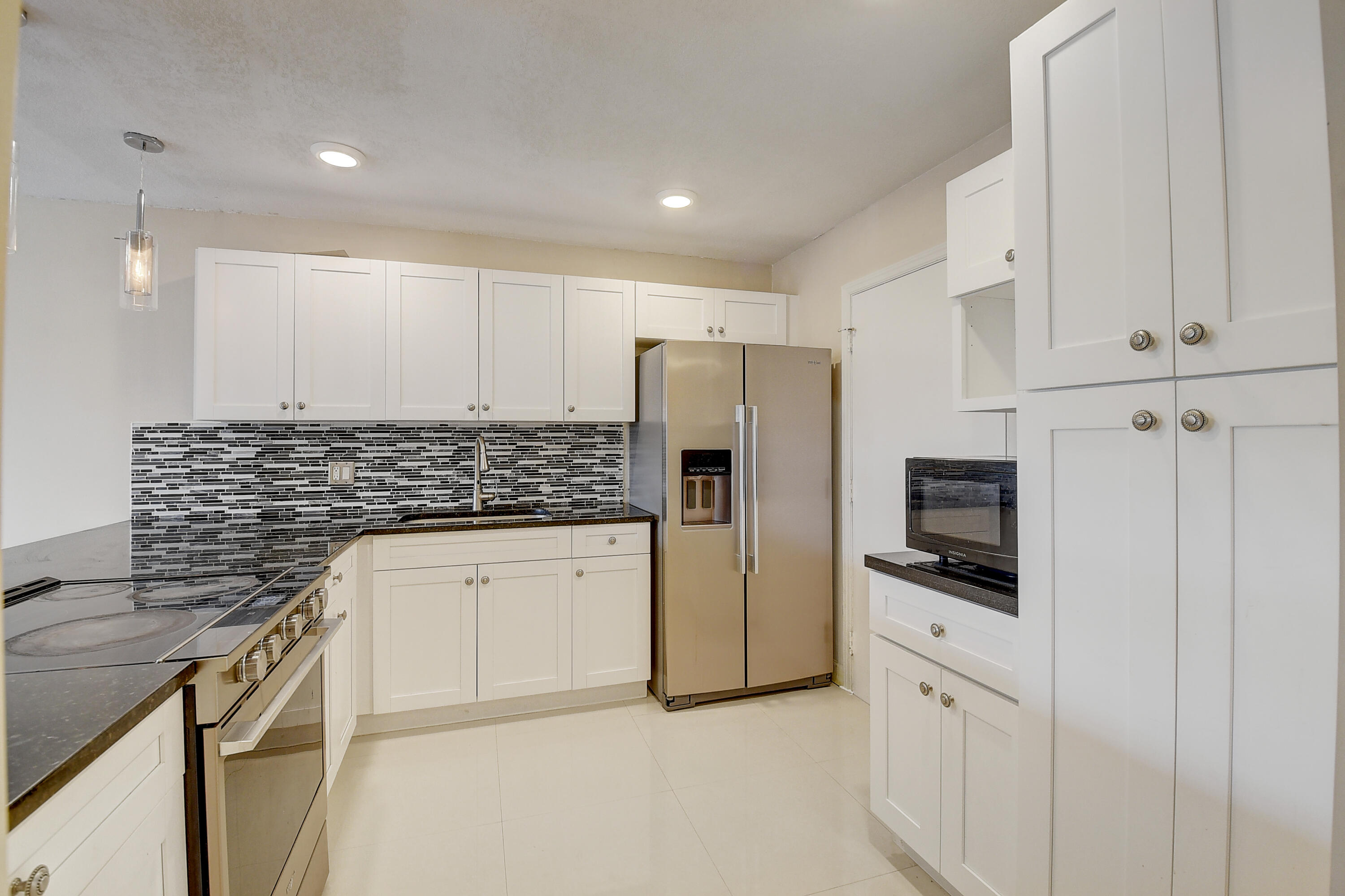 22605 Southwest 66th Avenue, Unit 304 Boca Raton, FL 33428 - Photo 12 of 25 Kitchen