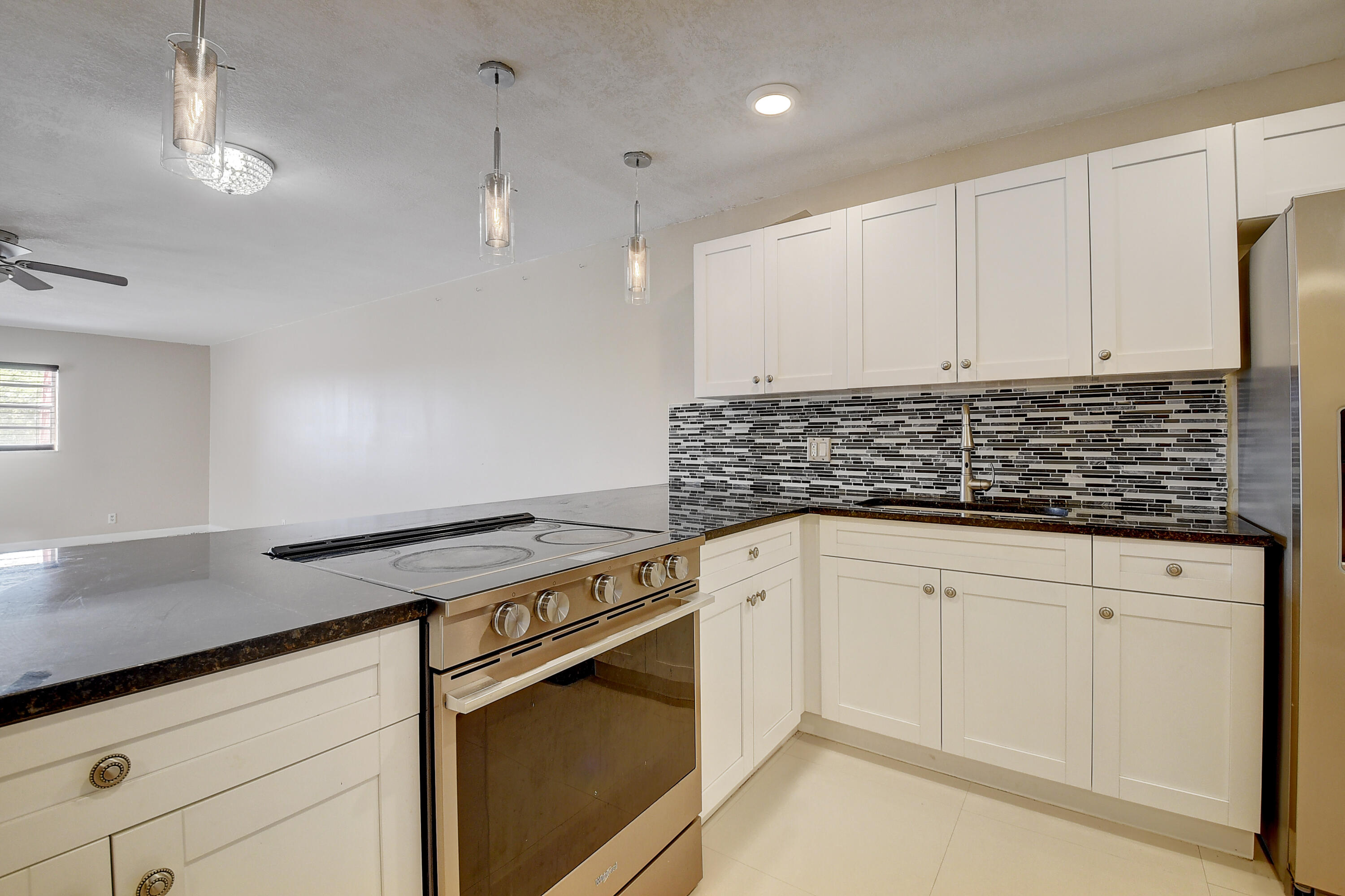 22605 Southwest 66th Avenue, Unit 304 Boca Raton, FL 33428 - Photo 13 of 25 Kitchen
