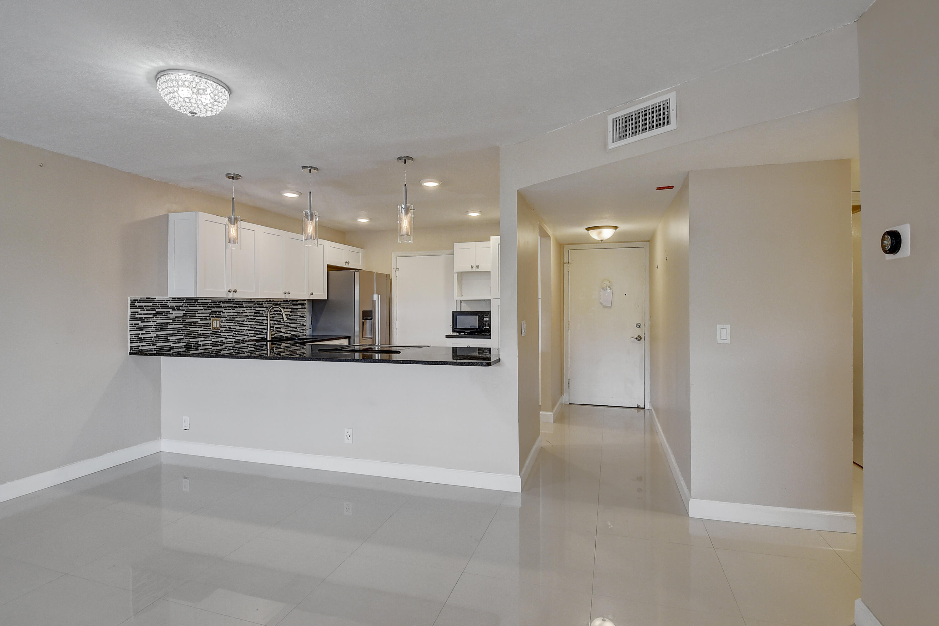 22605 Southwest 66th Avenue, Unit 304 Boca Raton, FL 33428 - Photo 4 of 25 Kitchen