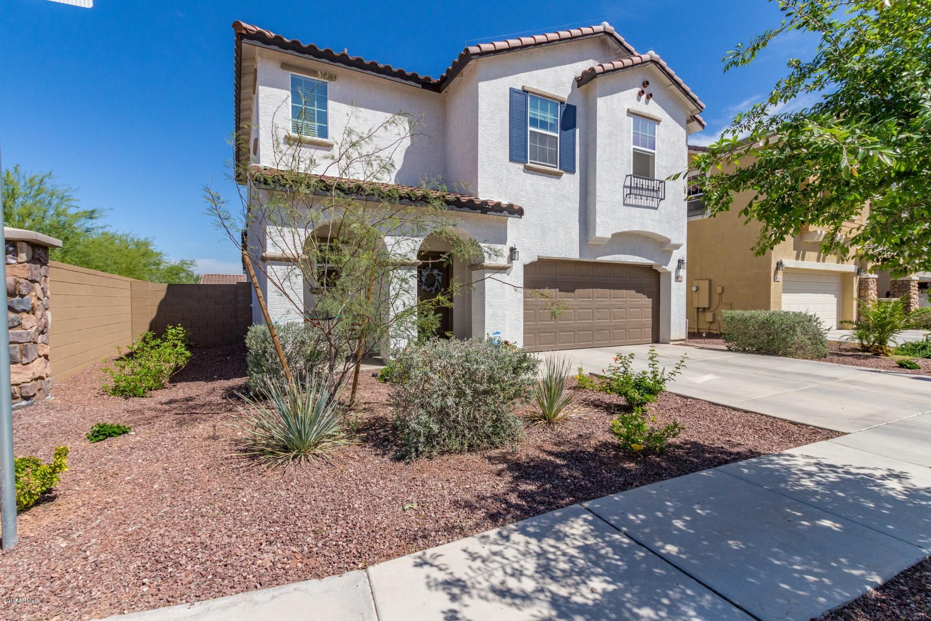834 East Beverly Road Phoenix, AZ 85042 - Photo 3 of 29 a front view of a house with garden