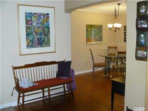 8009 Larkhaven Road Charlotte, NC 28216 - Photo 14 of 16 a view of a dining room with furniture
