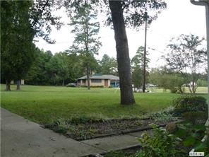 8009 Larkhaven Road Charlotte, NC 28216 - Photo 16 of 16 a view of a house with a yard