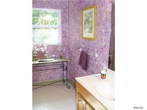 8009 Larkhaven Road Charlotte, NC 28216 - Photo 10 of 16 a bathroom with a sink and a bathtub