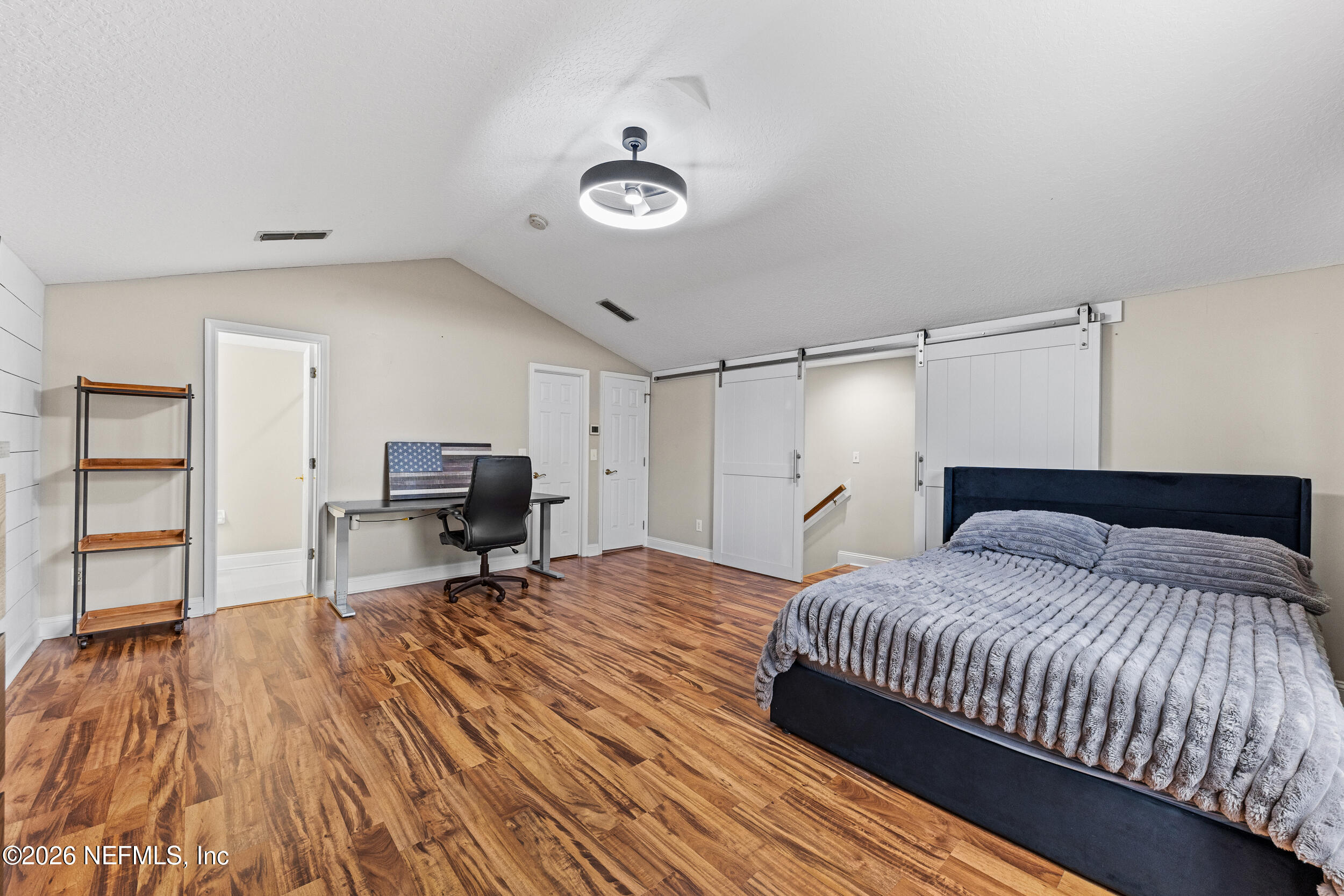 604 Gopher Court St. Johns, FL 32259 - Photo 36 of 73 Vaulted Ceiling & Sleek Barn Doors