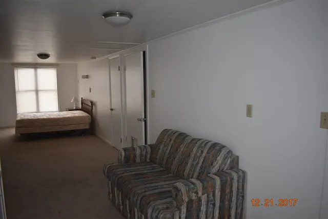 a view of a room with table and chair