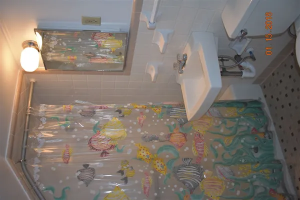 a view of kitchen with furniture and a window