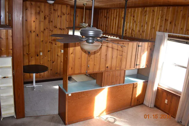 a bathroom with a sink and mirror